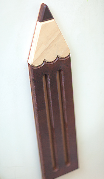 carved wood pencil