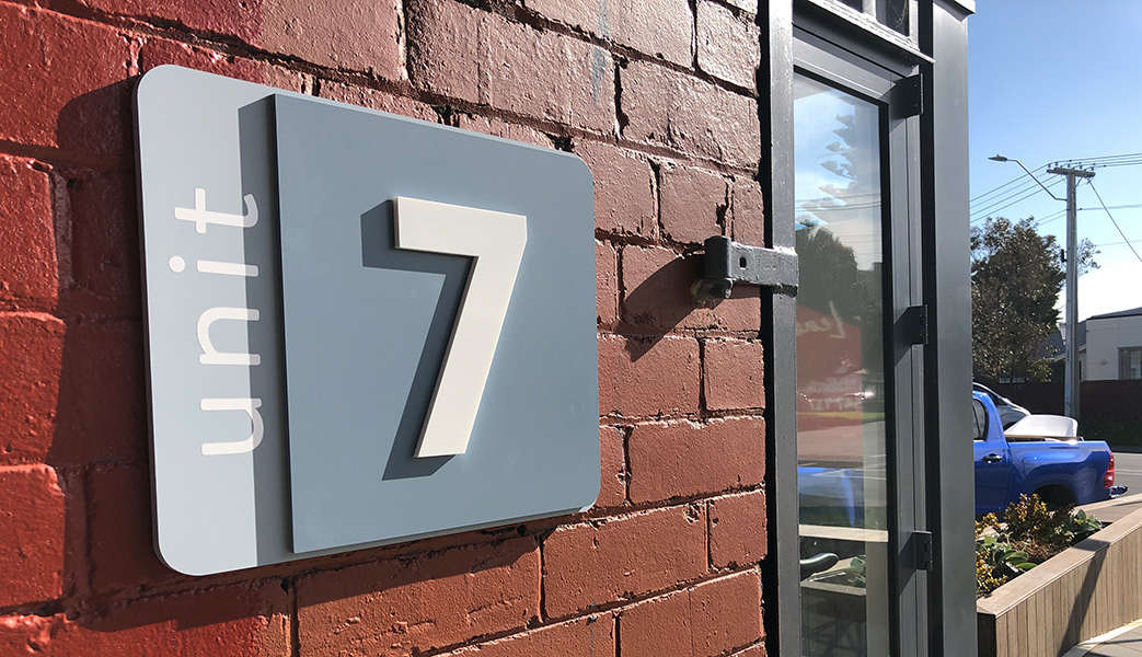 building unit number sign