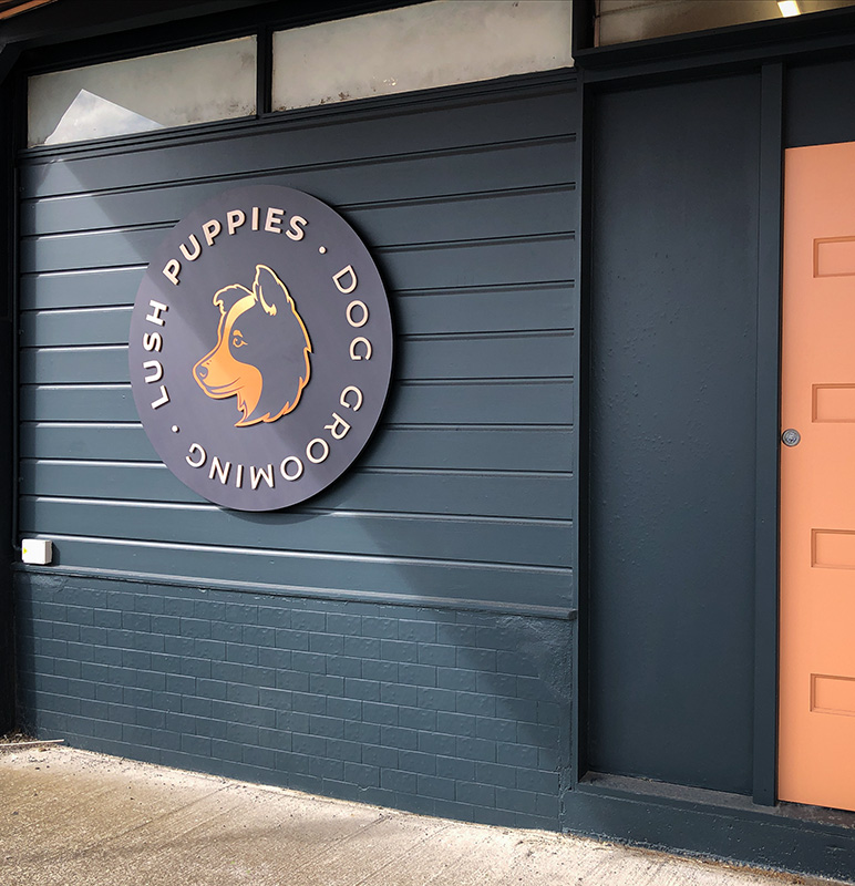 Lush Puppies wall logo sign